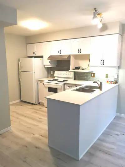 Locate right beside highway 85, Kiwanis Park, Tim Hortons and other amenities. Two full bathrooms up...