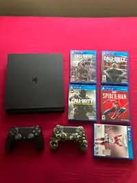 PlayStation 4 1TB with 5 Games and 2 Controllers