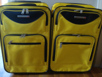 Couple of Luggage W/ Wheels