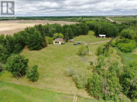 14.95 acres w/house &amp; with good well!