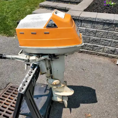 1961 15hp outboard motor. 110 psi on both cylinders and spark last time I checked, about 2 years ago...