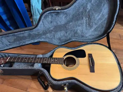 Fender acoustic guitar with hard case, View more