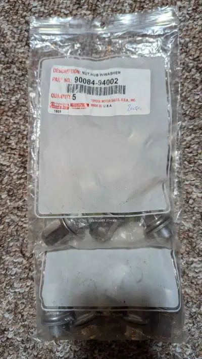 Brand new in original packaging. OEM Toyota Lexus alloy rim lug nuts. Will fit Toyota tundra, Tacoma...