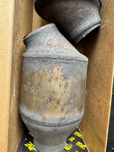 OEM two secondary (rear) catalytic converters from a 2011 BMW 328i. Fits E90/E92 models (confirm fit...