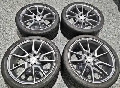 A Set of staggered alloy rims with pirelli sottozero winter tires 265/35R19 Front 295/30R20 Rears Ri...