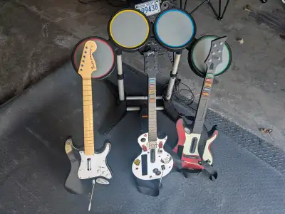 PS4 Rock Band Guitar and Drums / 2x Wii Guitar Hero guitars PS4 - Drums work good. Guitar (on left)...