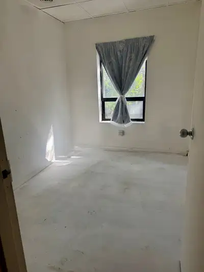 Unfurnished room with a large window on the 2nd floor of a townhouse at Beverley St & Dundas St W, d...