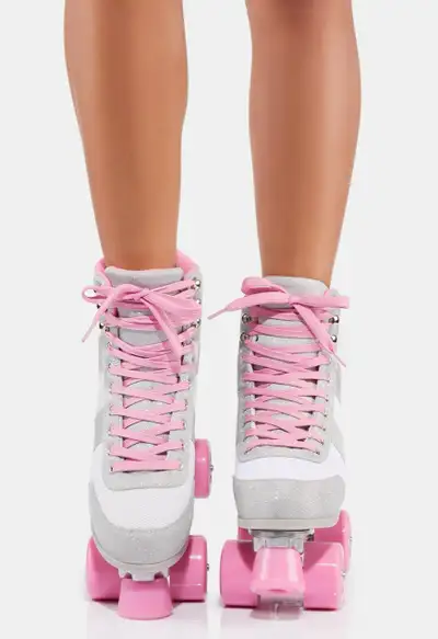 These are a pair of brand new, absolutely fabulous cute pink and sparkling grey retro roller skates...