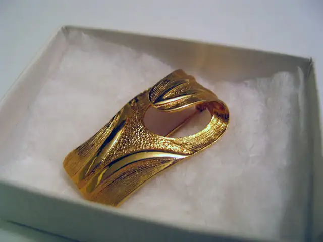 Two Gold Coloured Brooches