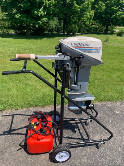 9.9 Evinrude outboard with new tank and hose. Plus 2 other antique outboards