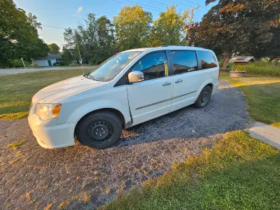 Selling because we bought another vehicle. Runs and works good. Has leather, tvs, heated seats. Body...