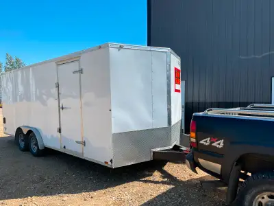 20 foot enclosed trailer, had tandem axle 3500lbs each axle, fold down rear ramp door, door height i...