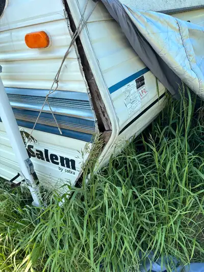 Can be towed however must tie down side panel due to damage. Please see photos for damages. Have own...
