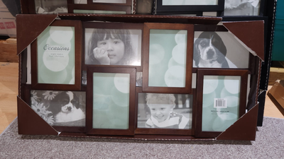 I have three new collage photo frames featuring: - 8 slots for 4" x 6" photos - can be mounted in ei...