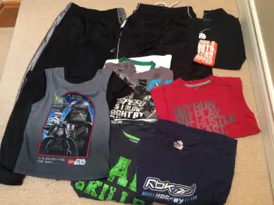 Boy's Assorted Clothing ranging from Size 2 to 12. Includes pants, shorts, long sleeved tops, T-shir...