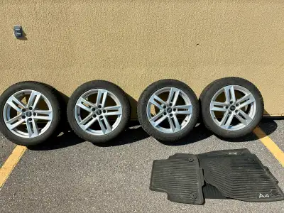 Audi 17inch rims comes with winter tires and winter car mats,tires are Dunlop,225/50R17 Decent quali...
