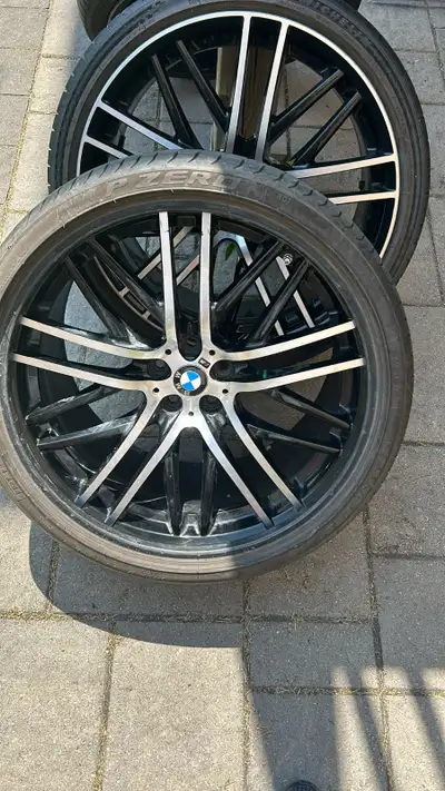 For sales two OEM BMW rims an tires. MUST SELL 27/30/21 sitting on Michelin pilot sports / Firelli P...