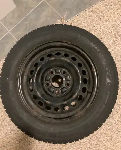 Set of 4 Michelin X-Ice tires (15 inch) on steel rims. The tires are on the older side but have some...