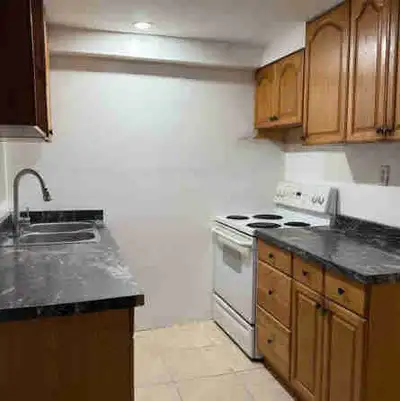 2 bedrooms, 1 full bath (bathtub), full private kitchen, living room/den, separate entrance, shared...