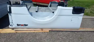 Here for sale is a new take off 8' truck box. Made entirely of aluminum. Includes side steps(as show...