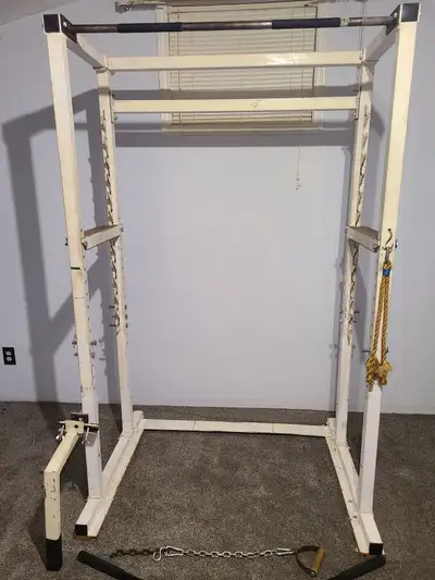 What an awesome deal. Squat Bench in excellent condition. Beige in colour. Holds a lot of weights an...