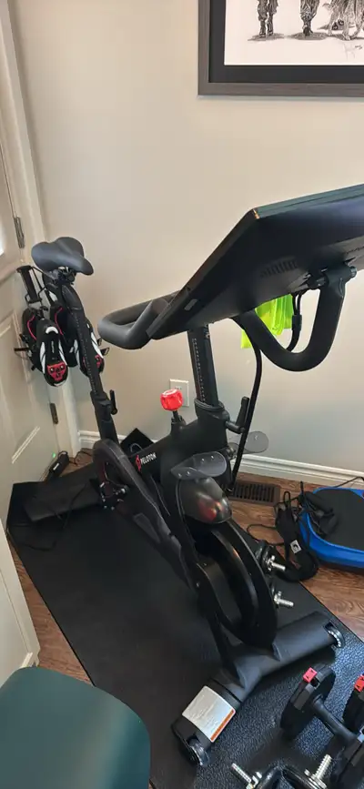 Peloton Bike In great condition Comes with size 10 mens and women’s 8 shoes Set of 1lb weights