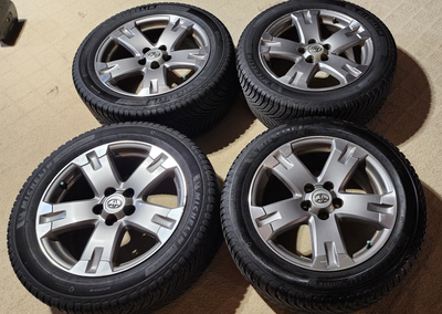 Complete set of four genuine Toyota 18" alloy wheels with 235/55R18 tires, from a Toyota RAV4. These...