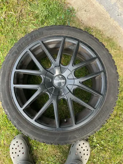 Touren 18 inch rims with brand new winter tires everything is less than a year old payed 1200 for ri...
