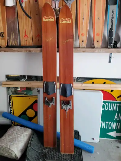 Super old. Wood fins. Boots rough, but wood is great. Look great too. Wall hanger or lean against a...