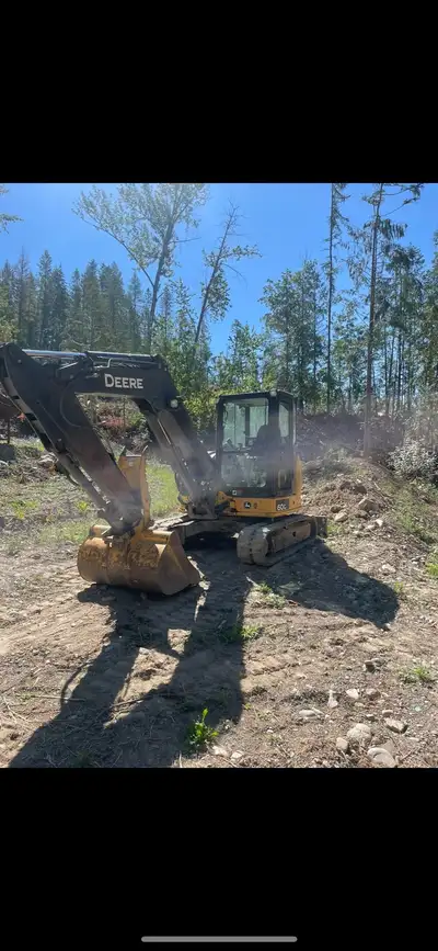 excavator mini or mid size, skid steer also have a dump truck Site preparation. Material hauling or...