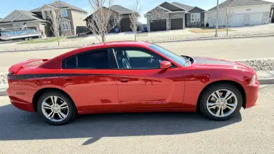 2012 Dodge Charger SXT Reliable, comfortable, and still a sharp-looking car with lots of room and cl...