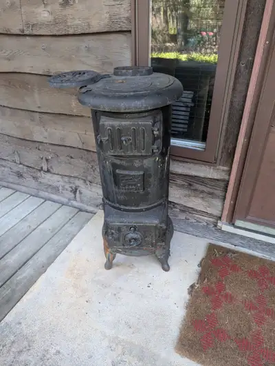 Antique wood stove, View more