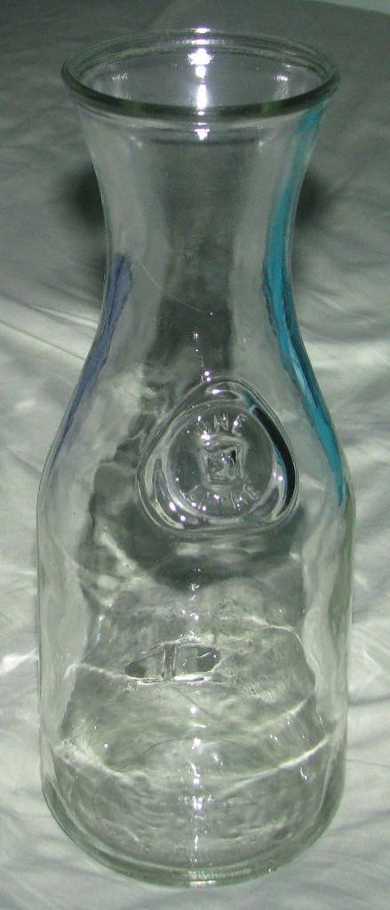 VINTAGE CANADIAN EMBOSSED BOTTLE in Arts & Collectibles in City of Toronto