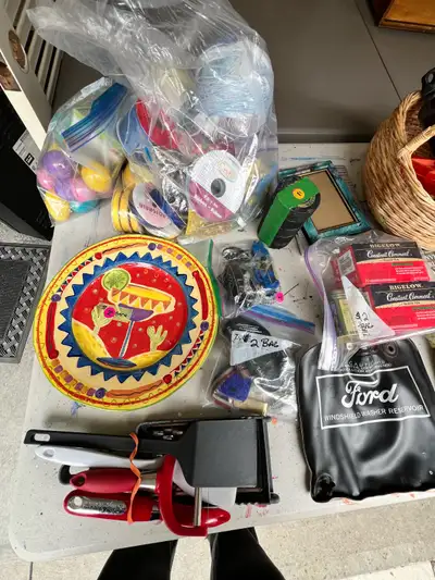 Items leftover from Garage Sale everything on table asking $65. Pick only east end at central locati...