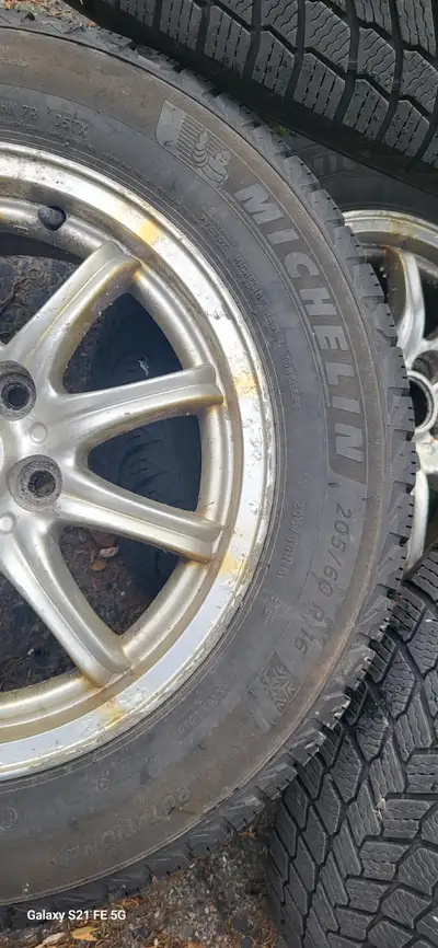 Four Michelin winter Tire 205/60/R16 96H with rim Mag original from Mazda good for Mazda 3 or 6. It...