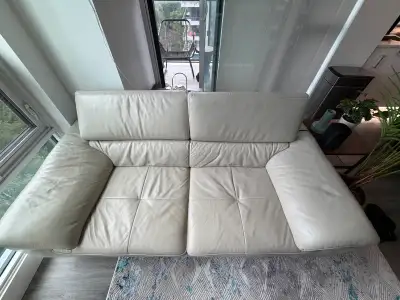 Mobilia Off-white Leather 2-person couch w/ adjust headrest, View more