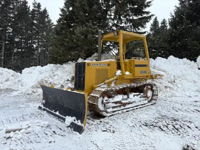 For sale John Deere 650G dozer has a ripper on the back machine works and runs great. Lots of pushin...
