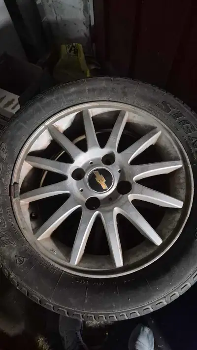 Set of 4 15 inch aluminum chevy 4-bolt pattern. Fits chevrolet, pontiac, Oldsmobile, Buick, and Satu...