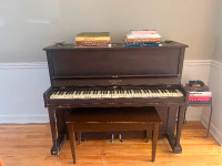 Free piano with bench. Pick up only.