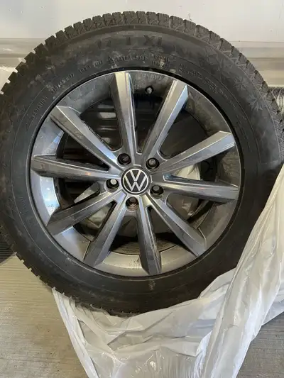 These like new Continental Viking Contact 7 winter tires, sized 215/65 R17, are mounted on genuine V...