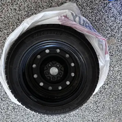 Set of 4 Michelin X-Ice Snow winter tires with black steel rims for sale. Price for new tire is $170...