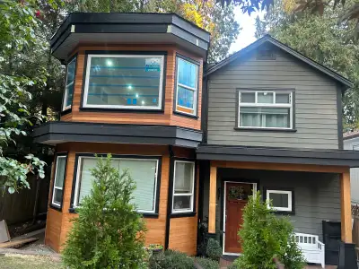 Fully furnished 450 sq. ft. bachelor studio located on the second floor of a family home, situated o...