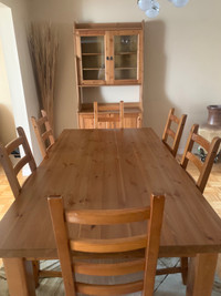 Table with shelving and six chairs