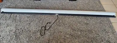 Has some scuffs but is in over all good condition and shape. 86" wide at the top. White screen is 83...