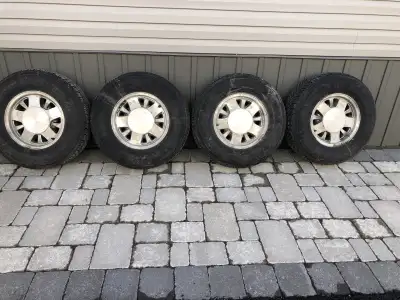 Set of 4 balanced Goodyear Ultra Grips off of a 1997 Silverado. 5 bolt aluminum Chevy rims At best t...