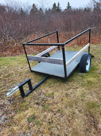 Utility trailer, used around yard. 6FT X 4FT BED.Easy 