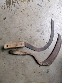 2 - Vintage Sickles and hand saw 