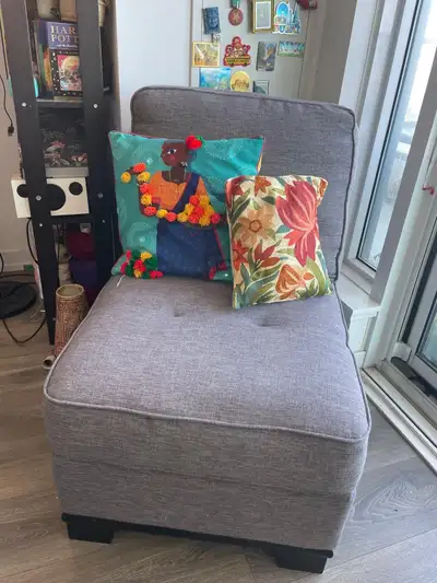 Grey lounge chair from Brick ( pillows not included). No issues in it, Moved to condo so no space fo...