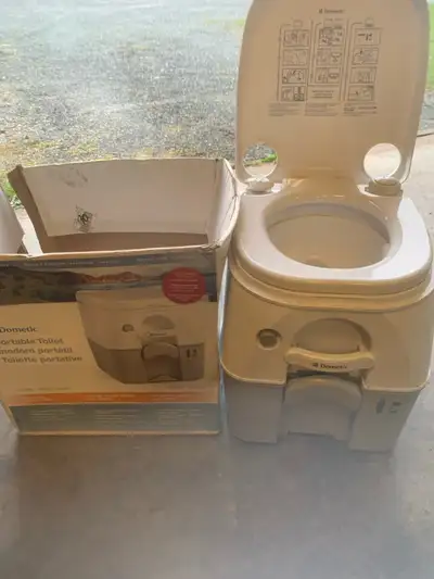 Portable flushing camping toilet. Used a few times for middle of the night tinkles. Saves running to...