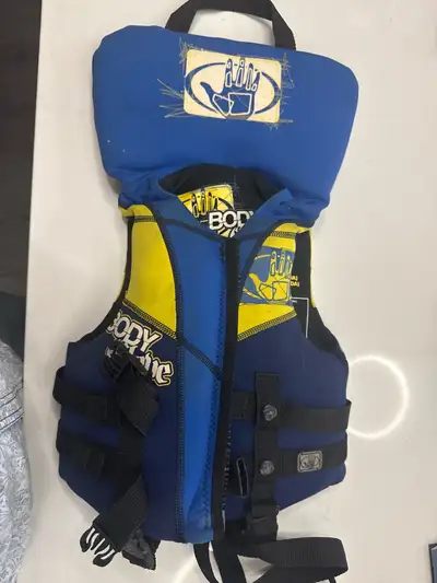 This is a Body Glove child's life jacket, ideal for ensuring your little one's safety during water a...